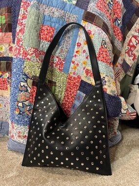 hobo style vegan leather studded bag